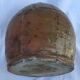 Ancient jug in glazed sandstone