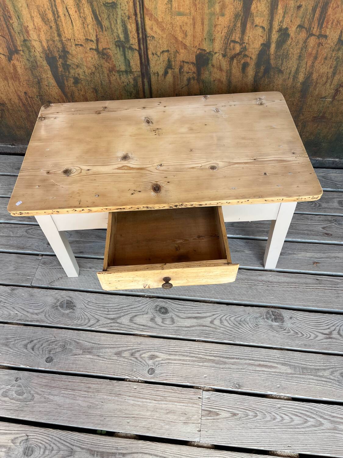 Raw wood and taupe coffee table