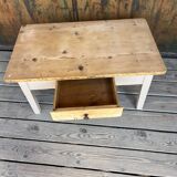 Raw wood and taupe coffee table