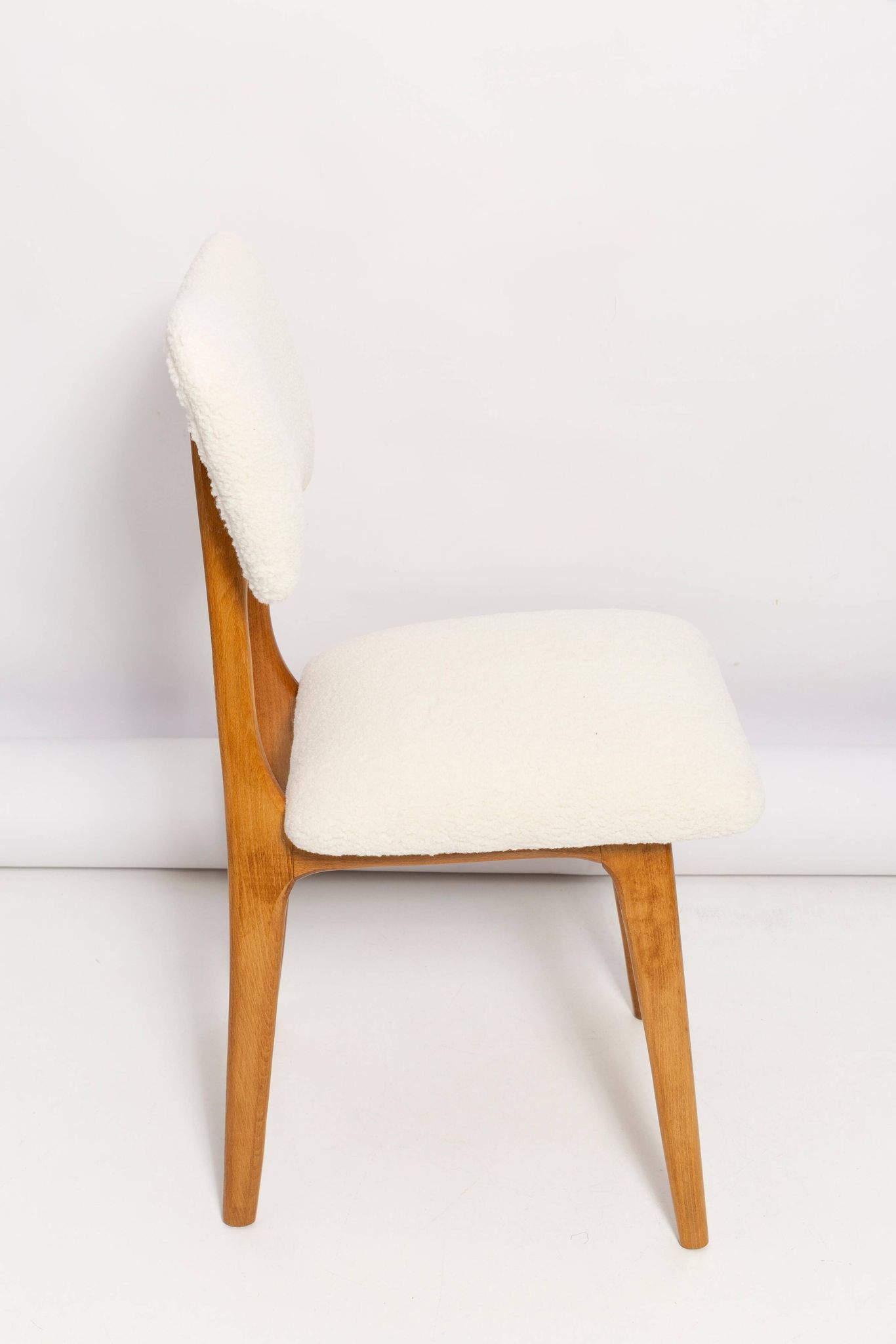 Mid-century "Butterfly" dining chair, light cream boucle, Poland, 1960s