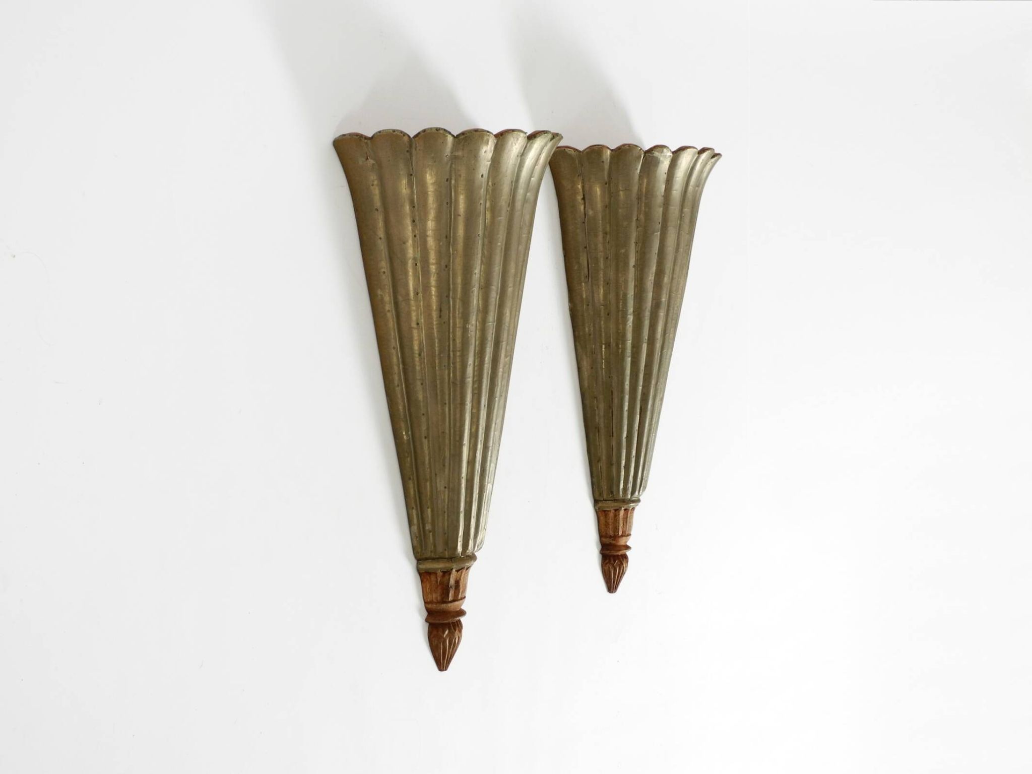 Two large, rare 1950s wall lamps made of wood with aluminum cladding
