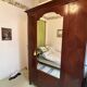 Mahogany inlaid wardrobe with a mirror