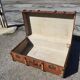 Old travel trunk made of wood and brass