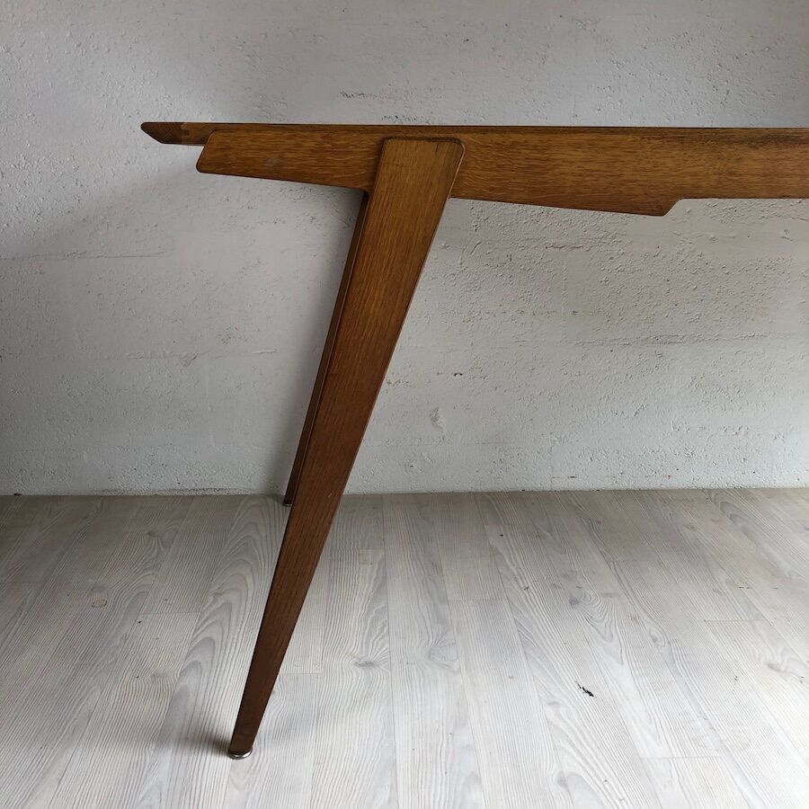 Dining table by Gérard Guermonprez by Magnani (1957)