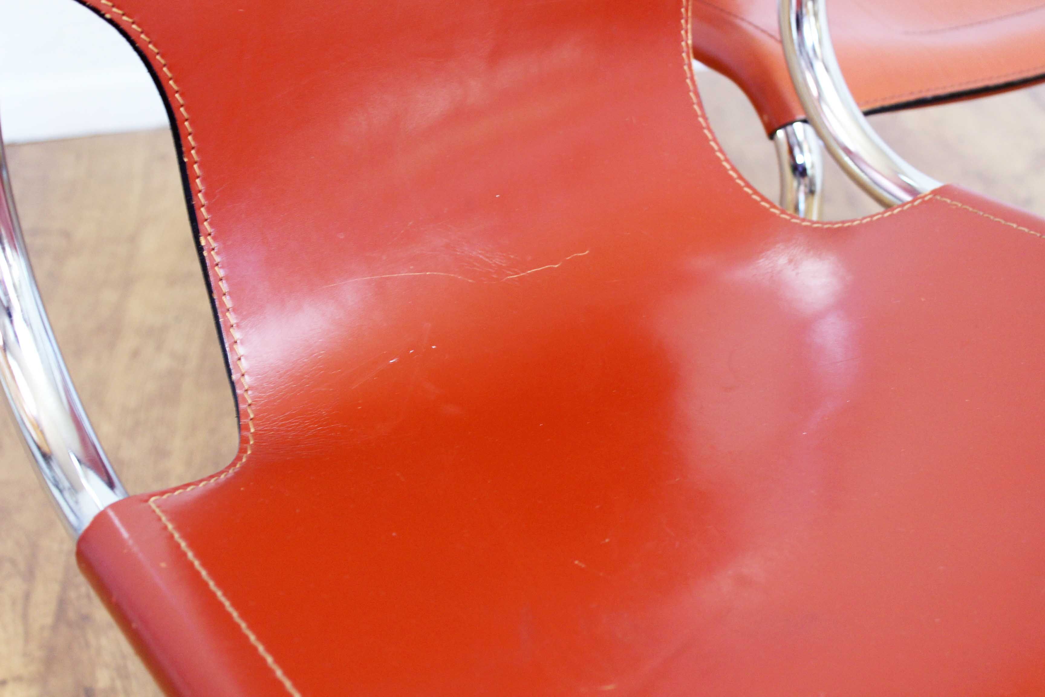 Pair of chairs in leather and chrome tube