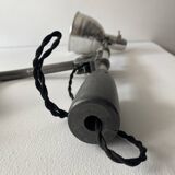 Old industrial wall light with counterweight.