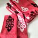 Vintage graphic red tablecloth and 8 matching napkins.