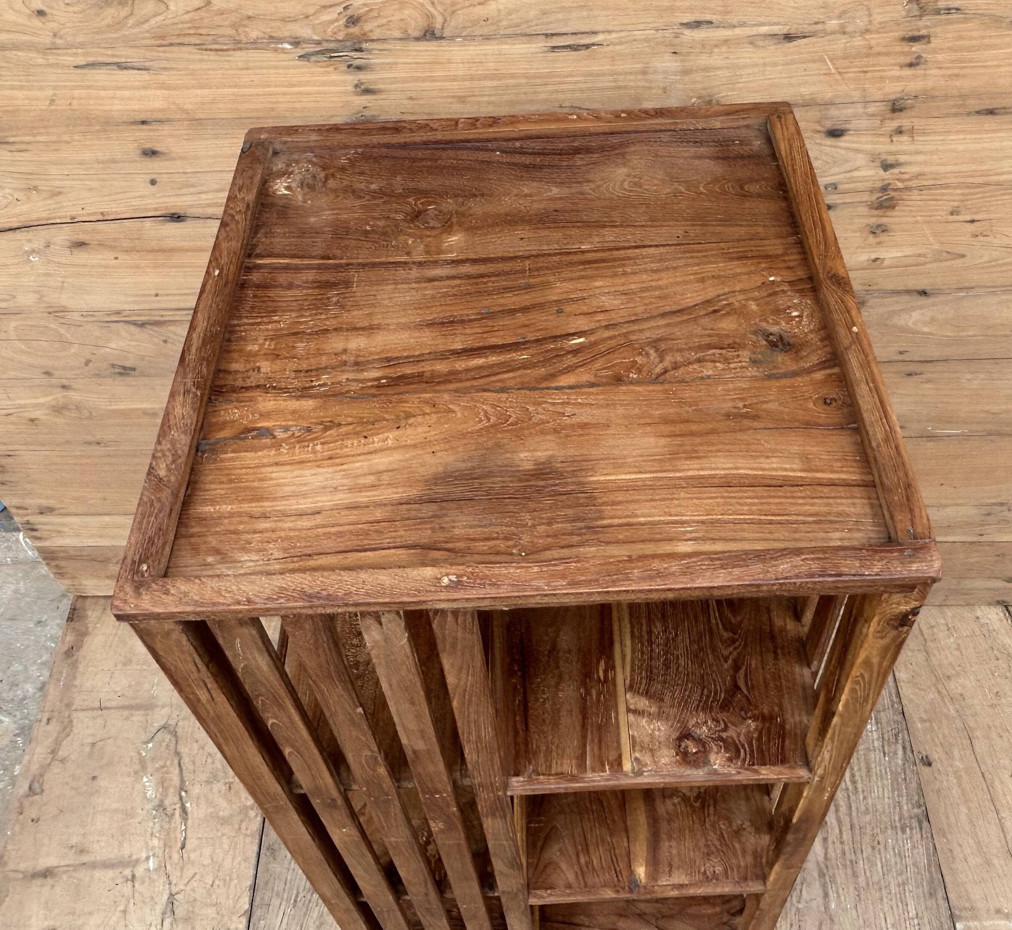 rotating library in Burmese teak