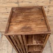 rotating library in Burmese teak