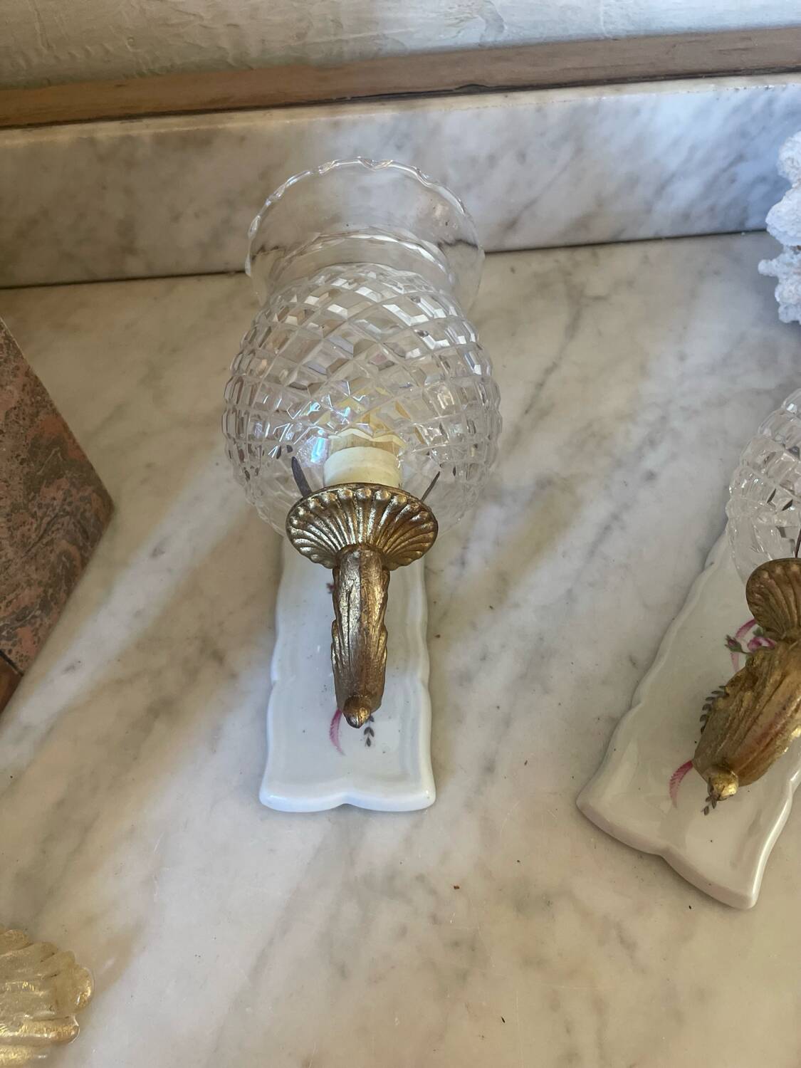 Pair of cut glass and Limoges porcelain wall sconces