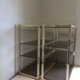 Pair of consoles brass shelves and smoked glass design Roche Bobois