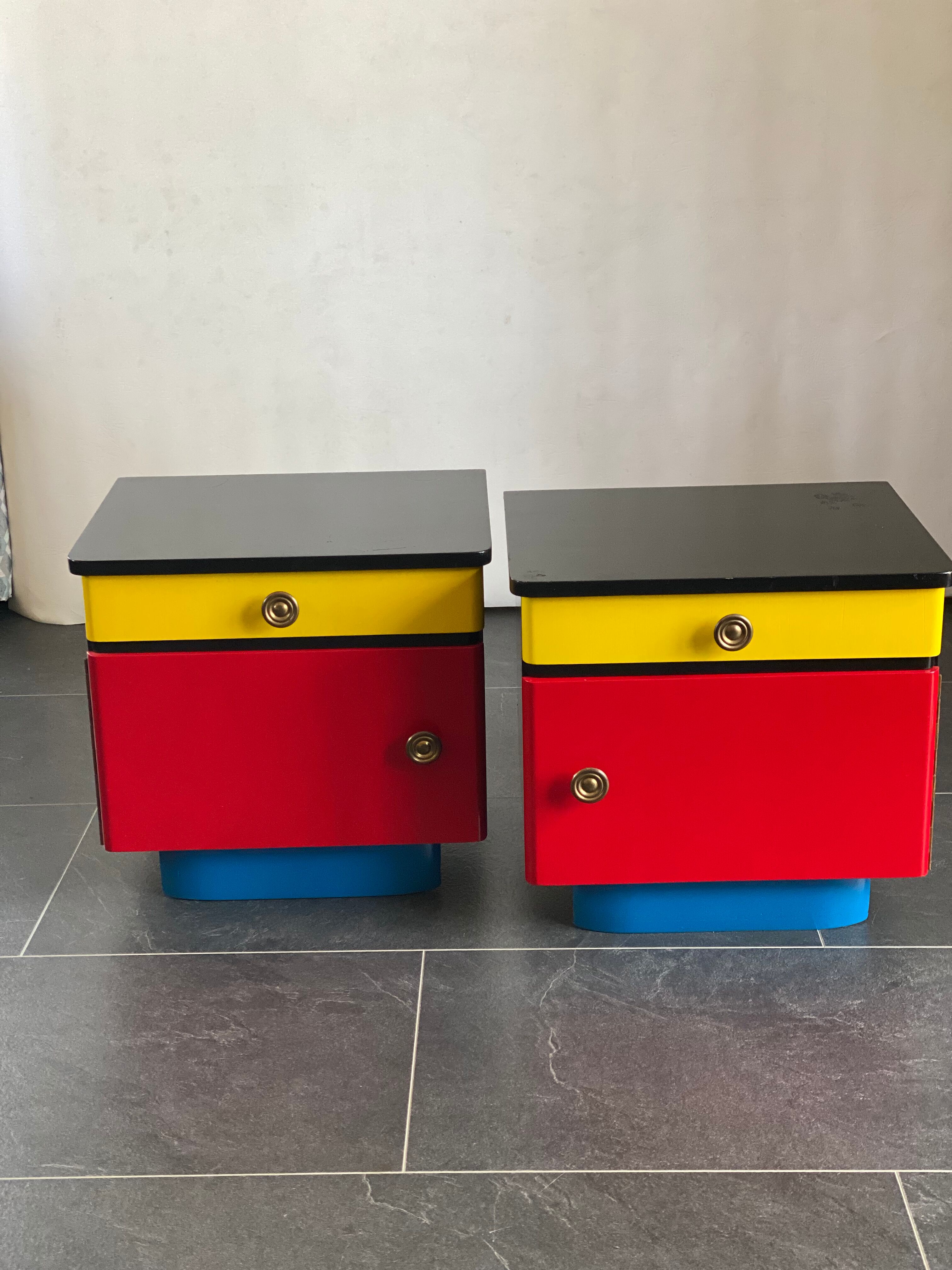 Pair of colorful massive teak night stands