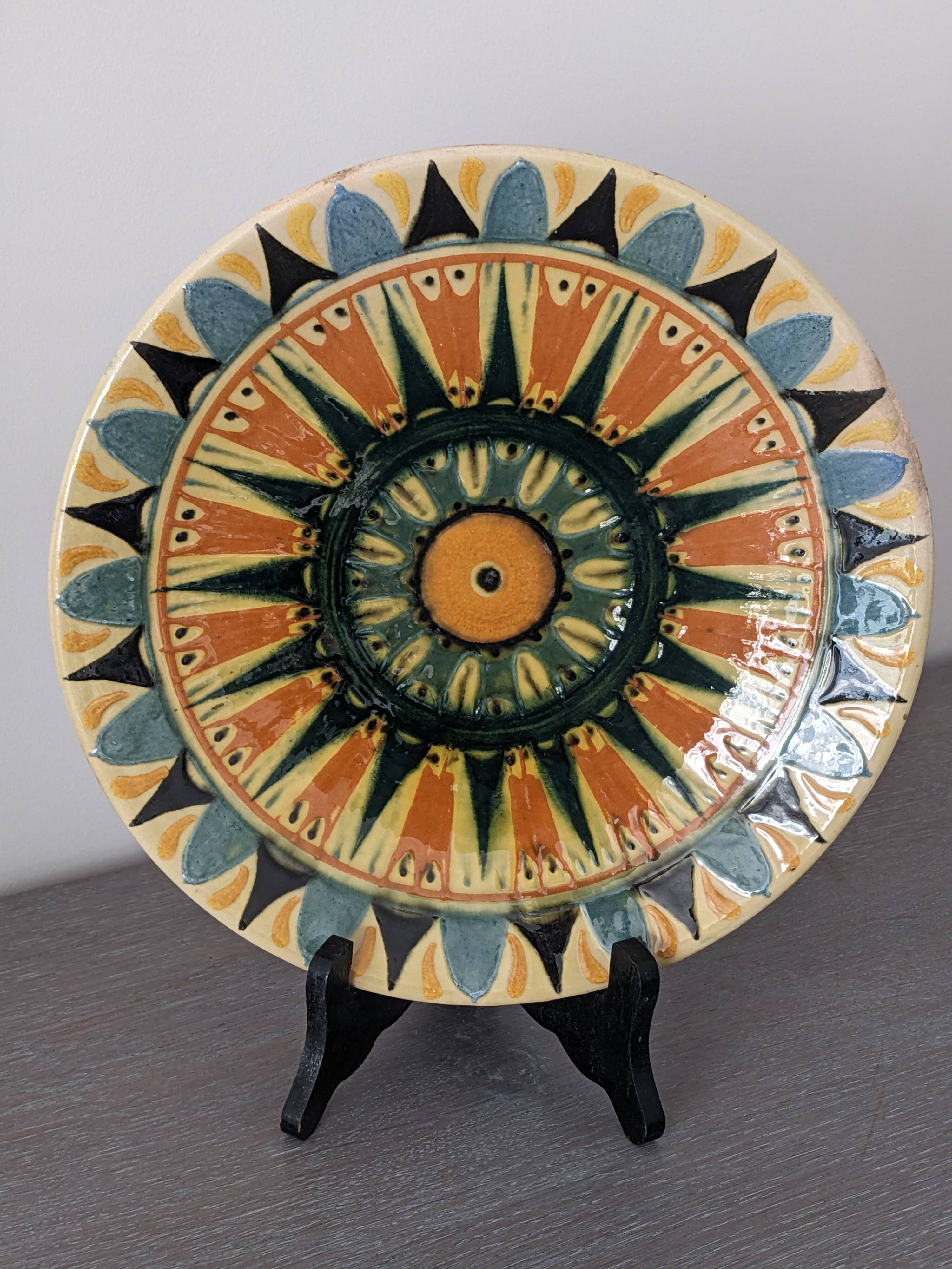 Vintage ceramic plate with enamel decoration