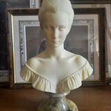Bust woman on pedestal
