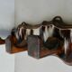 Wall hanger in burnt pine and cow skin