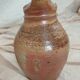 Old farm jug in glazed stoneware