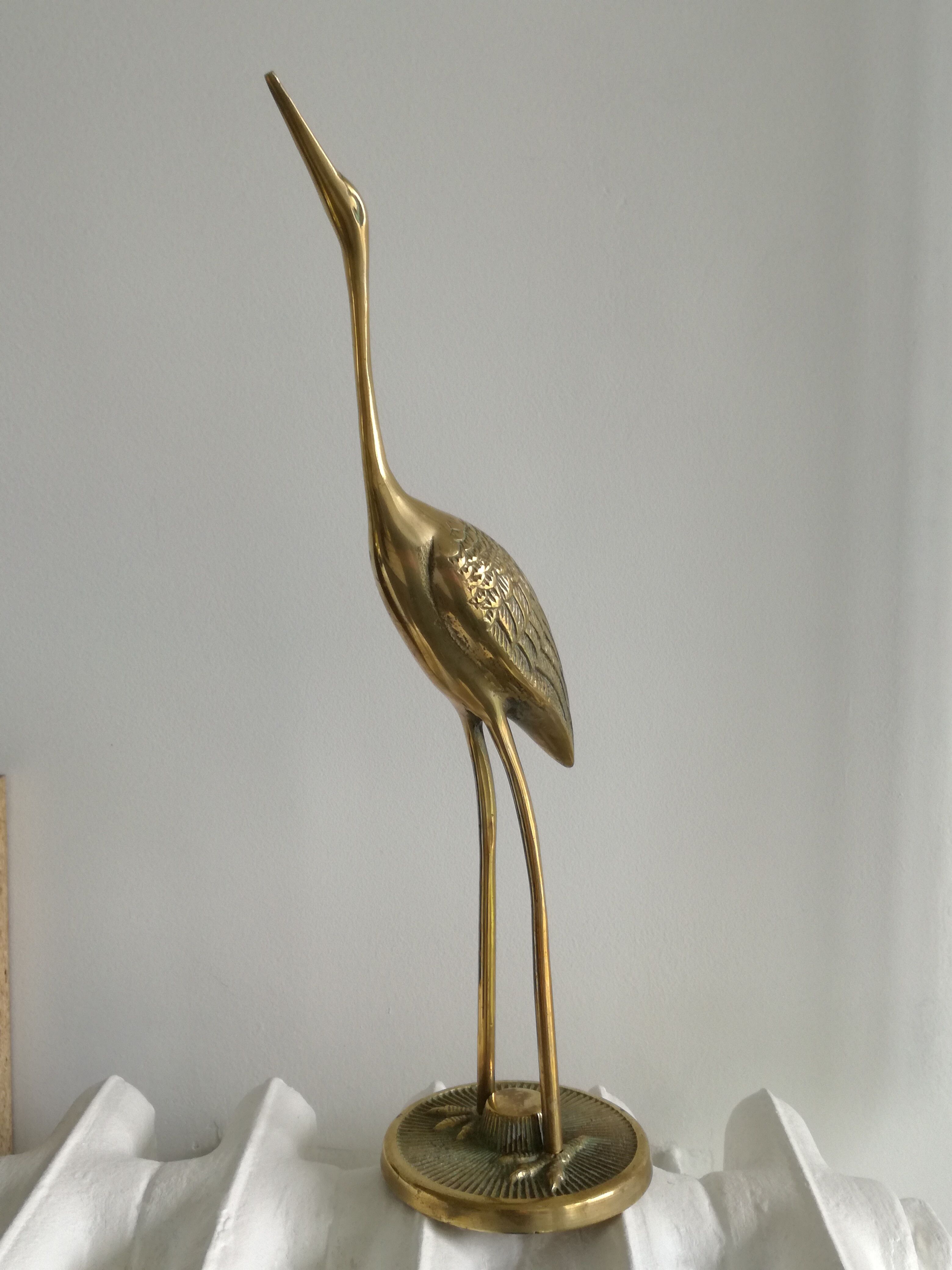 Heron vintage brass