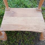 Raw wood bedside table