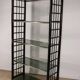 Vintage 1970s shelf in smoked glass with a bamboo-style structure.