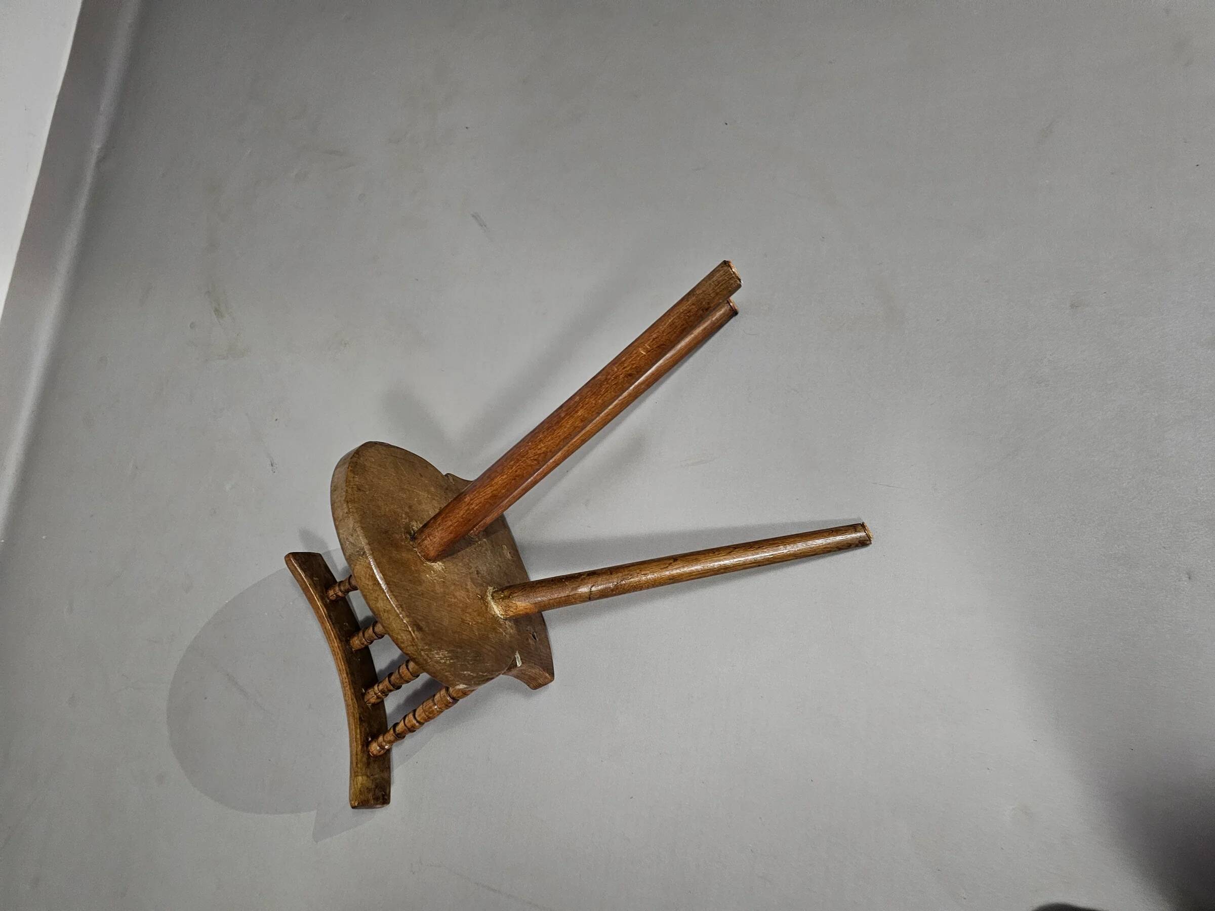 Old farmers tripod chair for decorative use