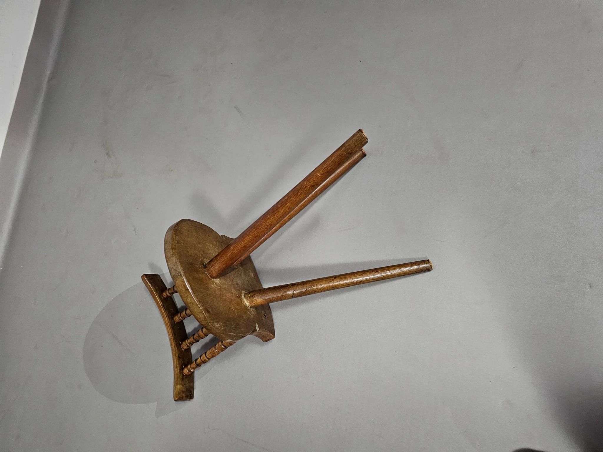 Old farmers tripod chair for decorative use