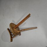 Old farmers tripod chair for decorative use