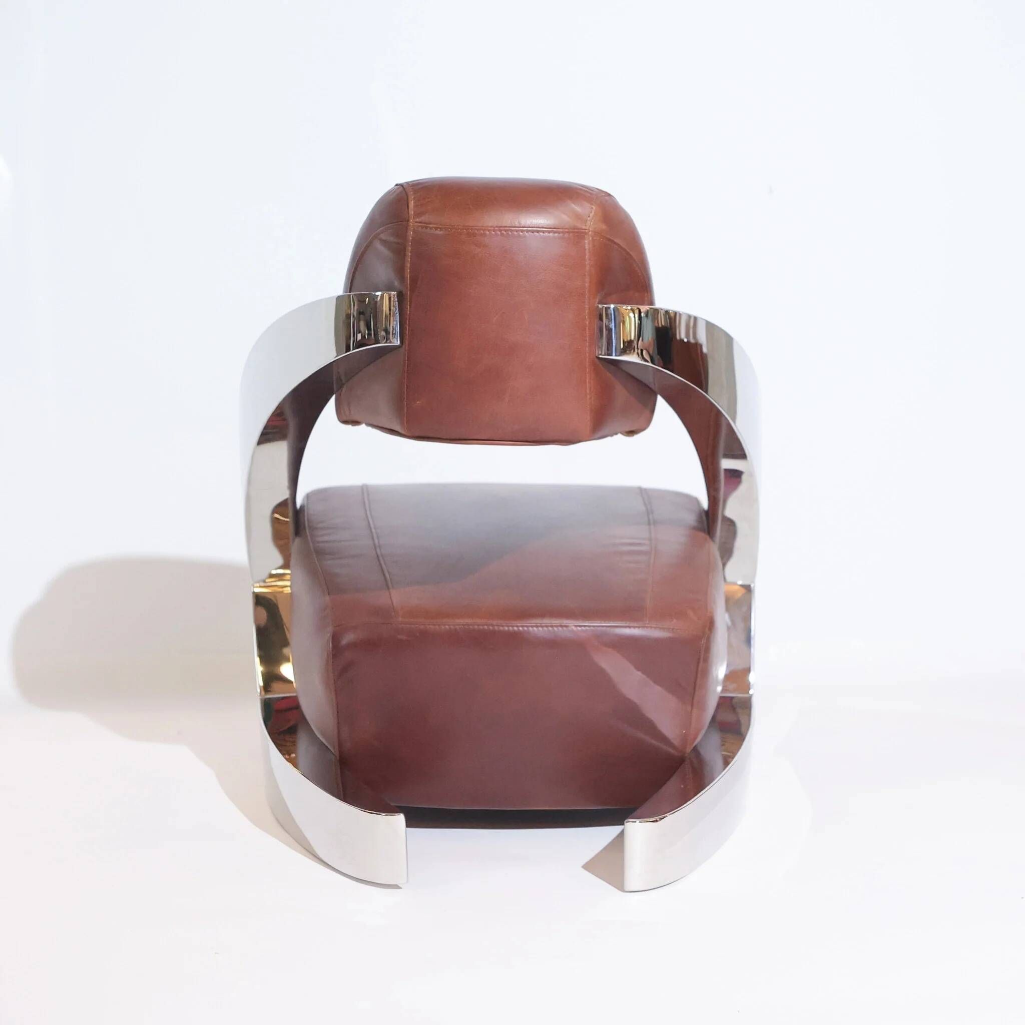 Pair of vintage lounge chairs Demon/Aviator in cognac leather and polished steel, Art Deco style.
