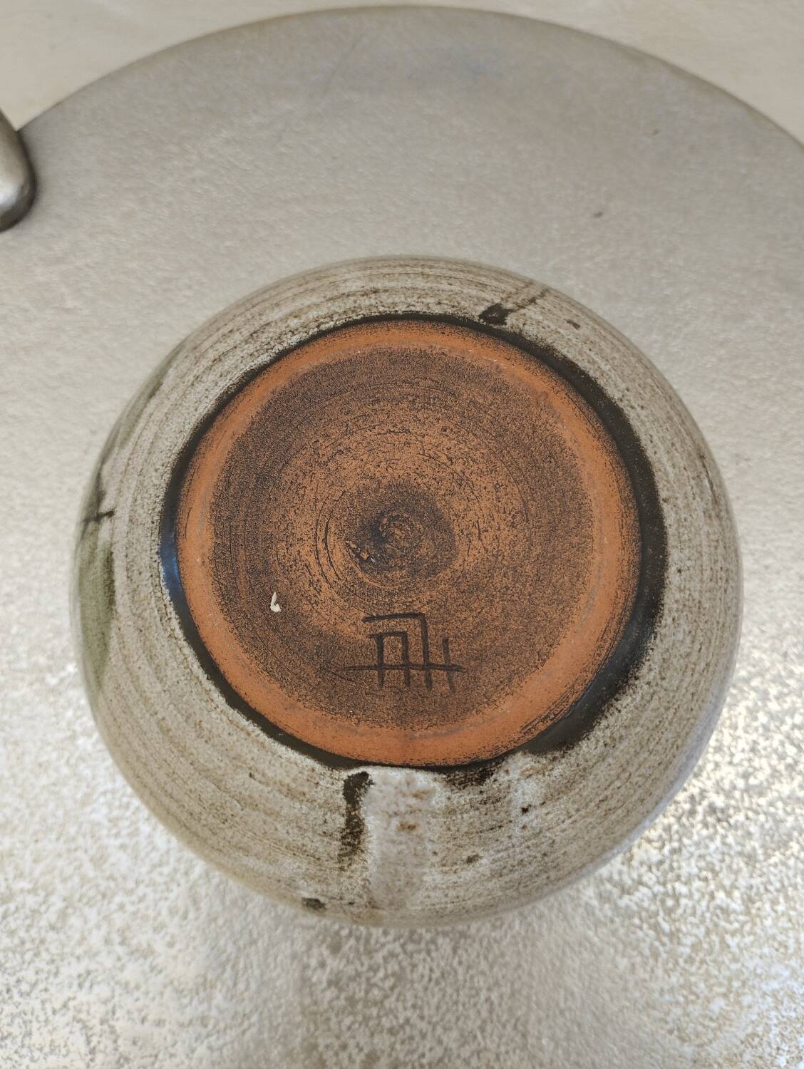 Covered enameled earthenware pot