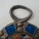 Mirror in metal and blue glass
