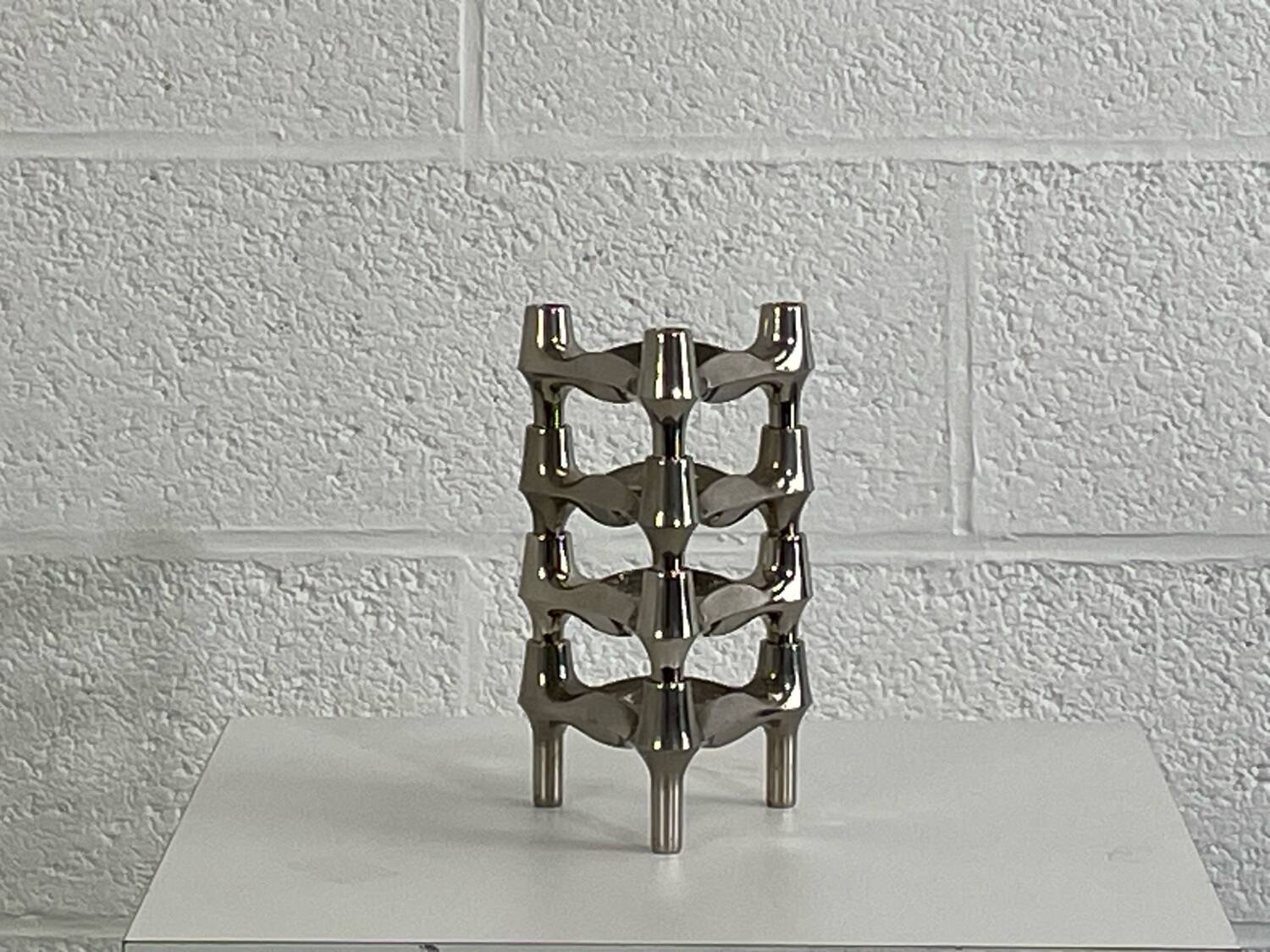 Series of 4 Nagel candlesticks