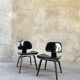 Pair of DCW chairs by Charles & Ray Eames in Black for Herman Miller 1950