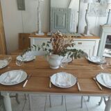 Farmhouse table with pearl gray base and raw wood top.