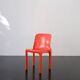 Orange "Selene" chair by Vico Magistretti / Artemide