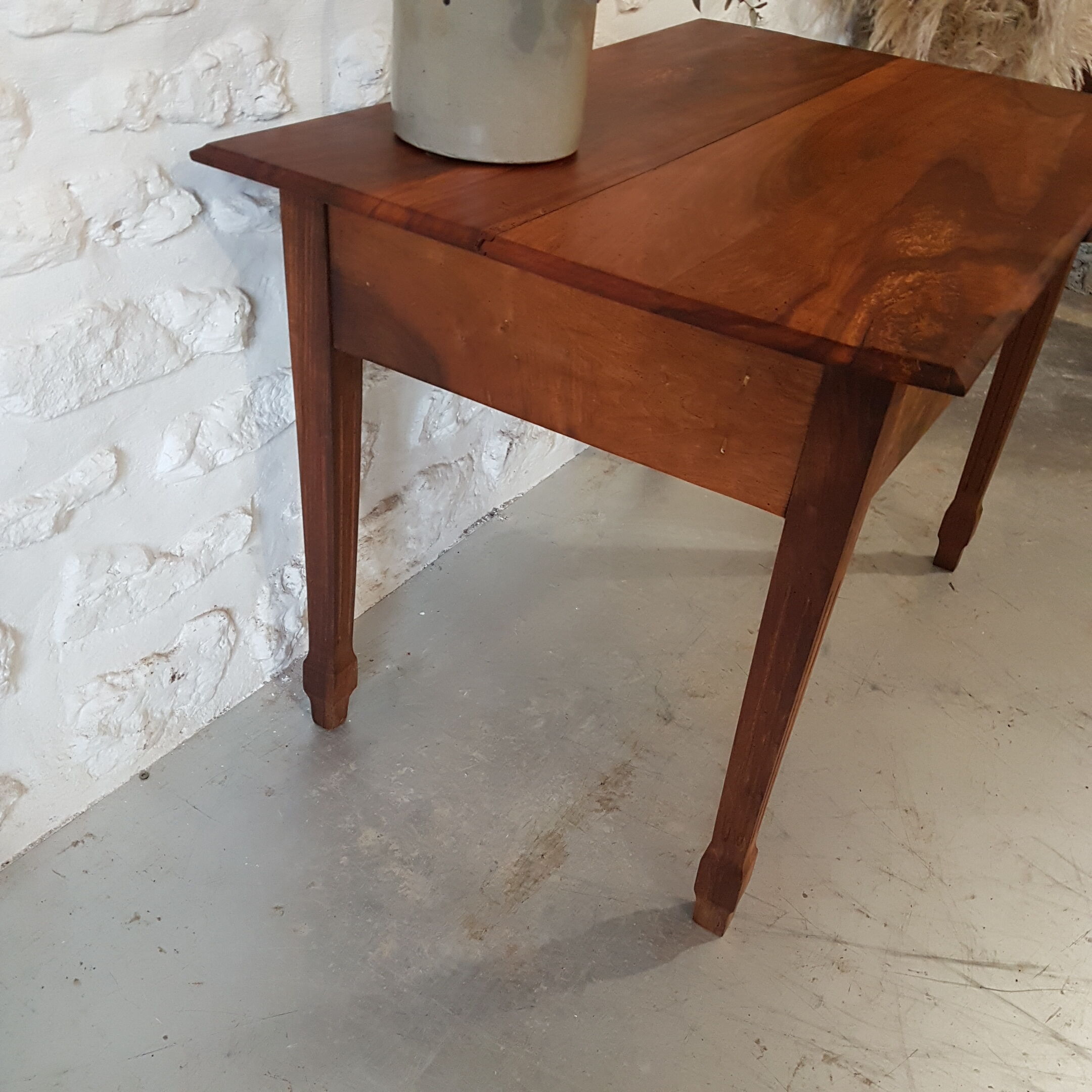 Walnut table with drawer