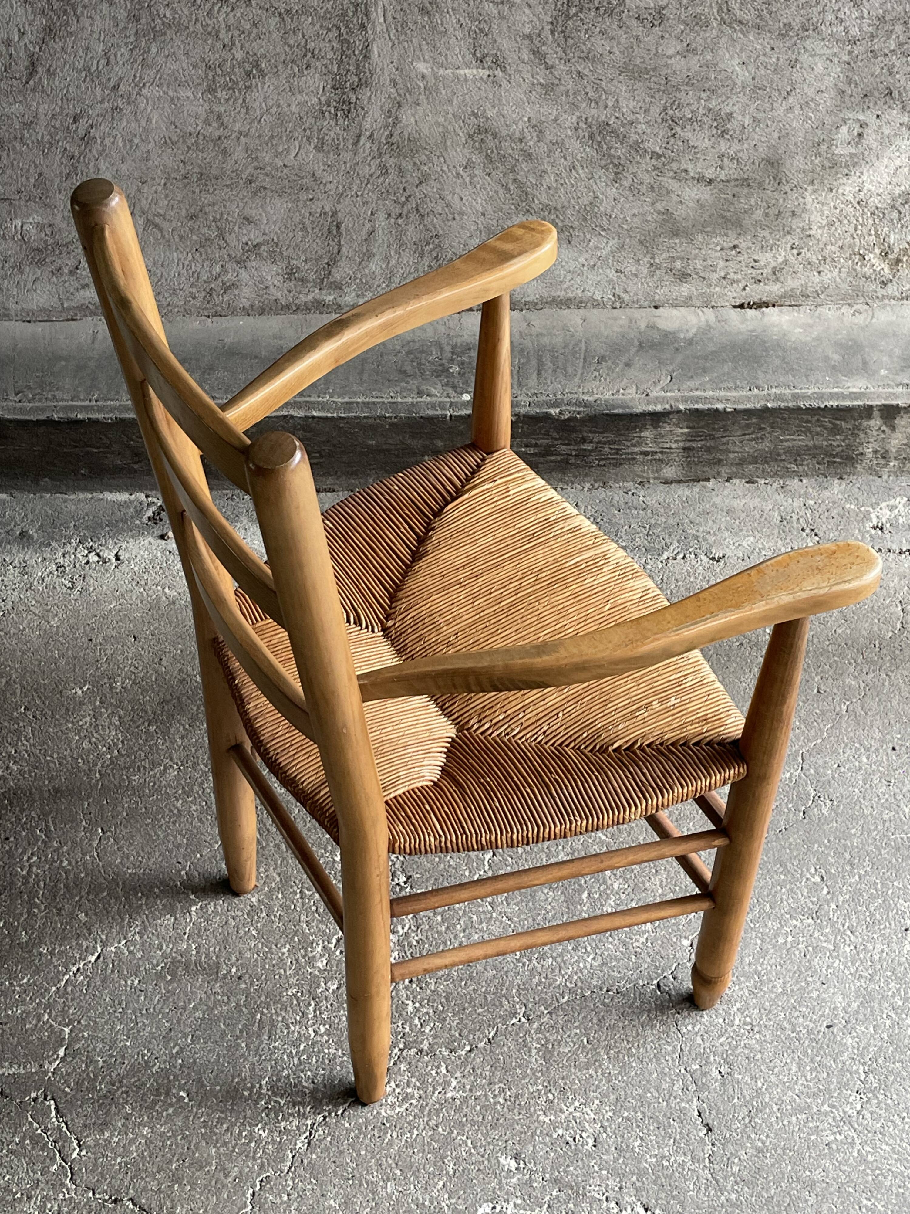 Straw chair with armrests, France