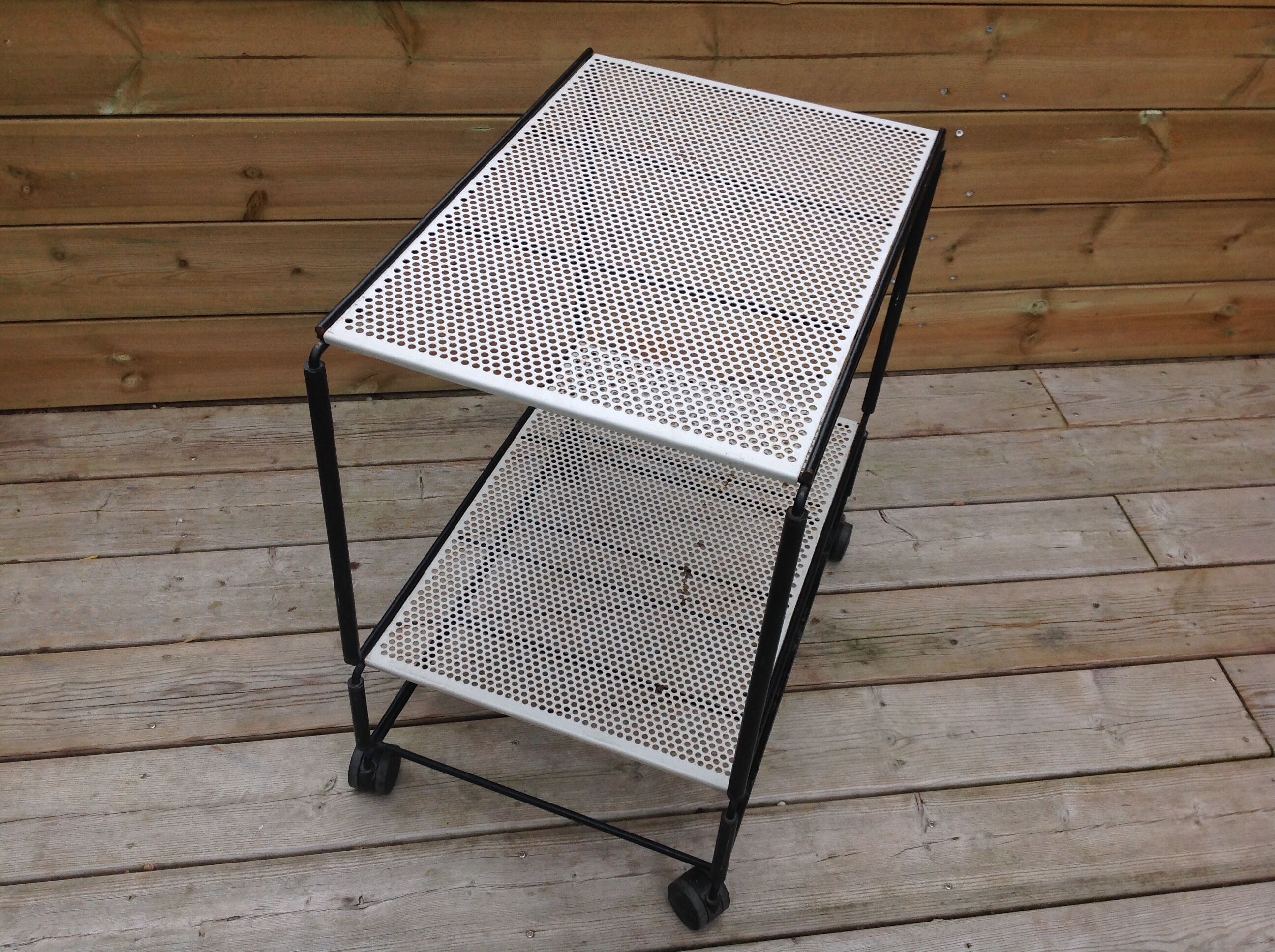 Perforated iron rolling table