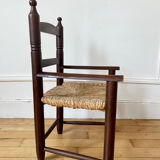 Wooden chair and children's straw