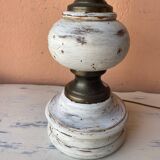 Round lamp base in white patina wood and brass