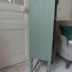 Small vintage bookcase enhanced in smoky green
