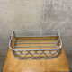 Gray wrought iron shelf