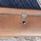 Brown vintage suitcase with CHENEY England brand travel tags