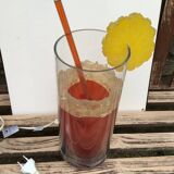 Vintage 80s cocktail lamp in colored glass with a straw and a slice