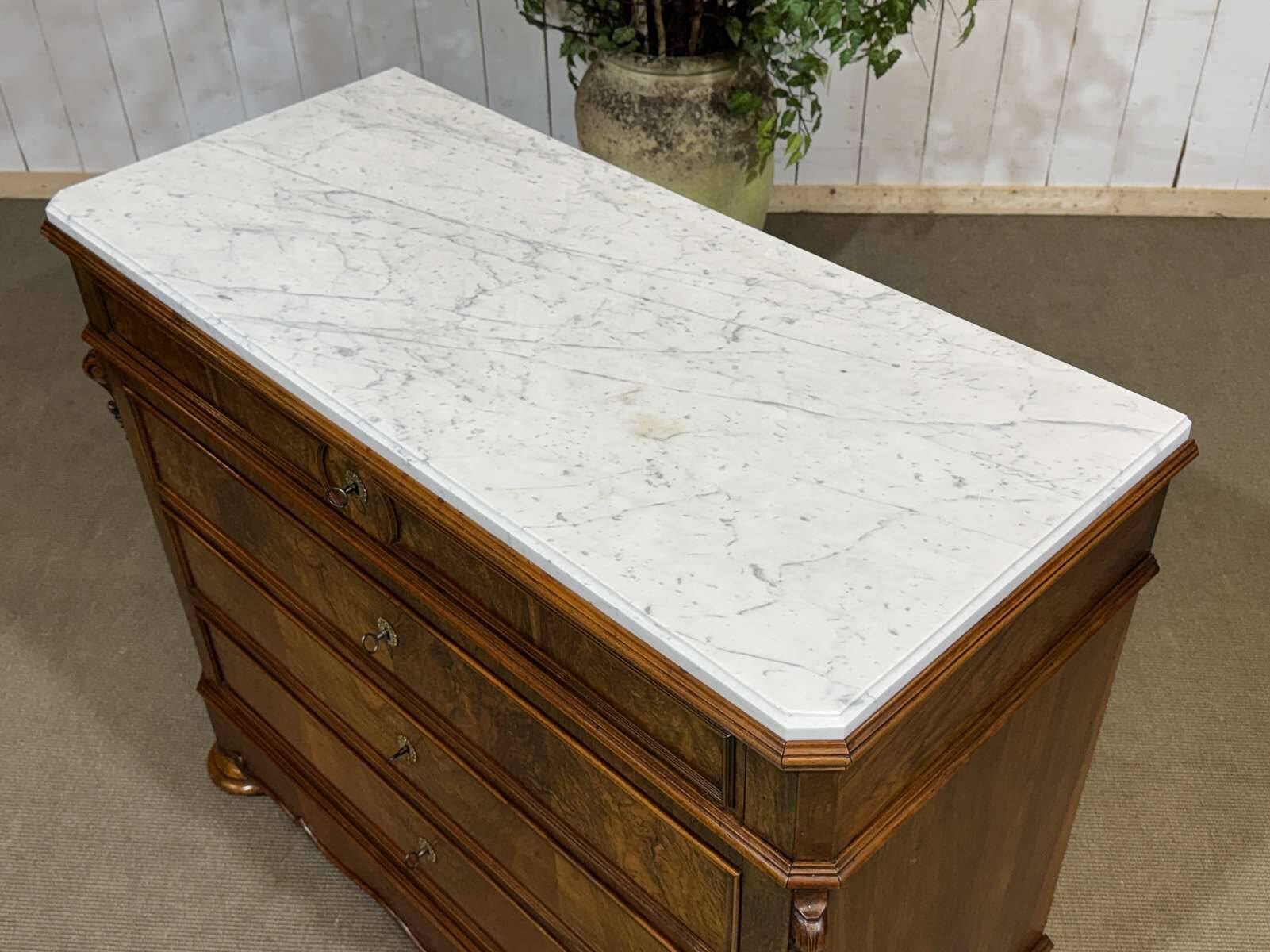 Napoleon III commode in walnut, fir and white marble from the 19th century.