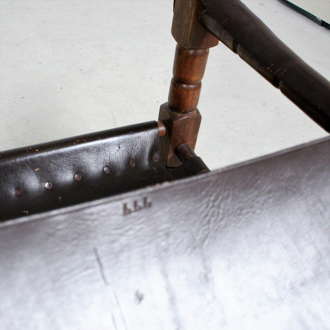 Pairs of vintage Safari style armchairs in wood and leather