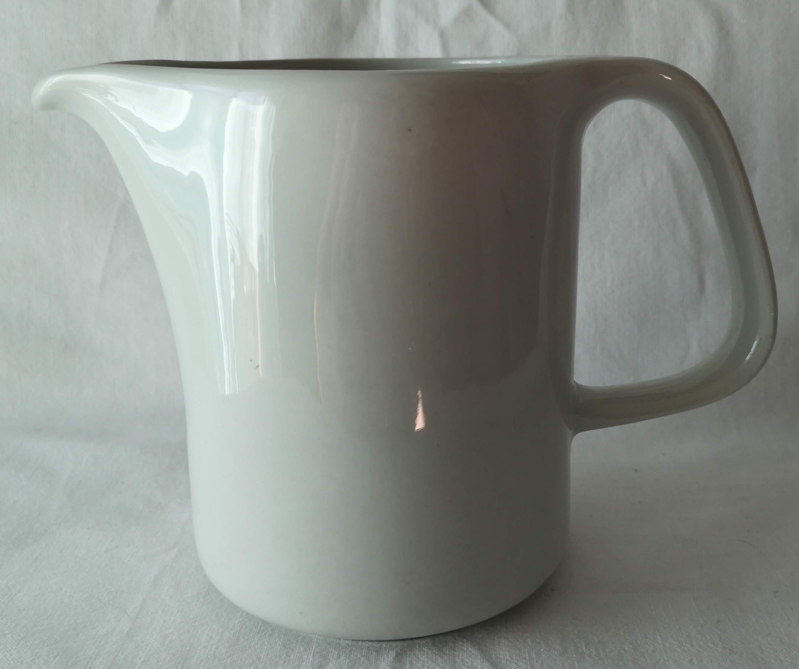Limoges white earthenware milk pitcher