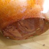 Enamelled terracotta jug