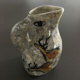 Zoomorphic pitcher parietal decoration
