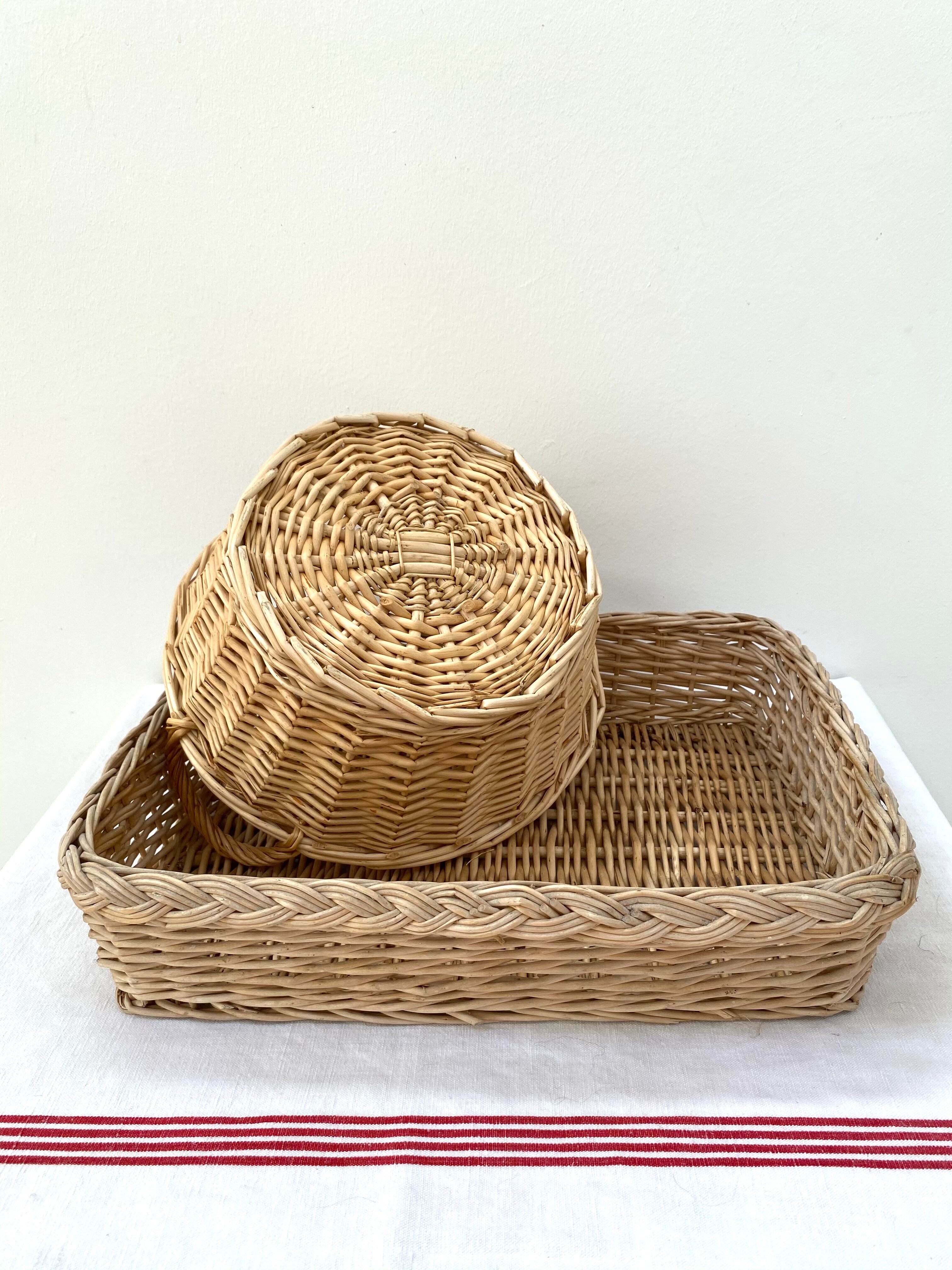 Duo of baskets in braided rattan