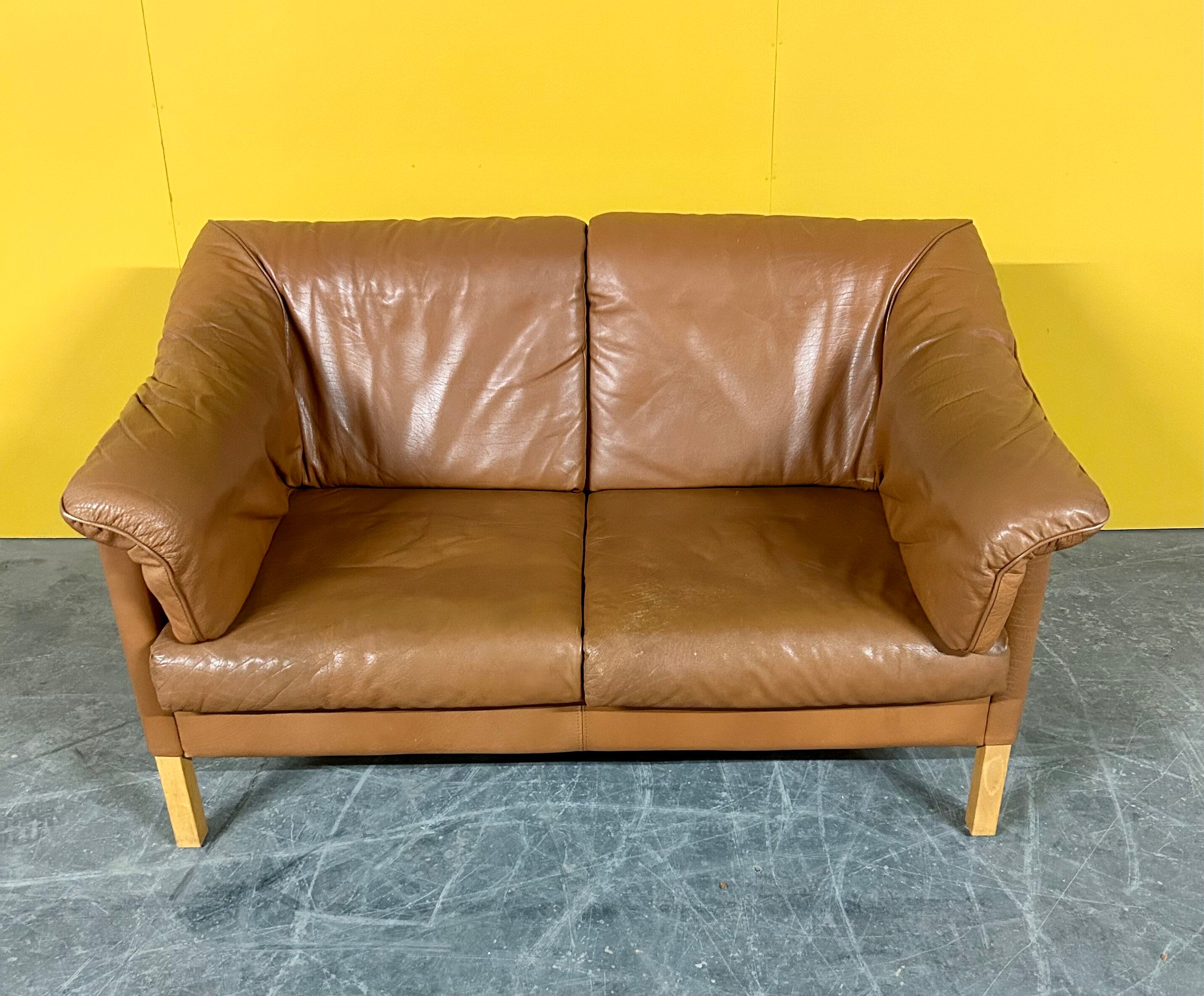 Danish two seater tan leather Stouby sofa