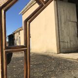 Mirror with parecloses